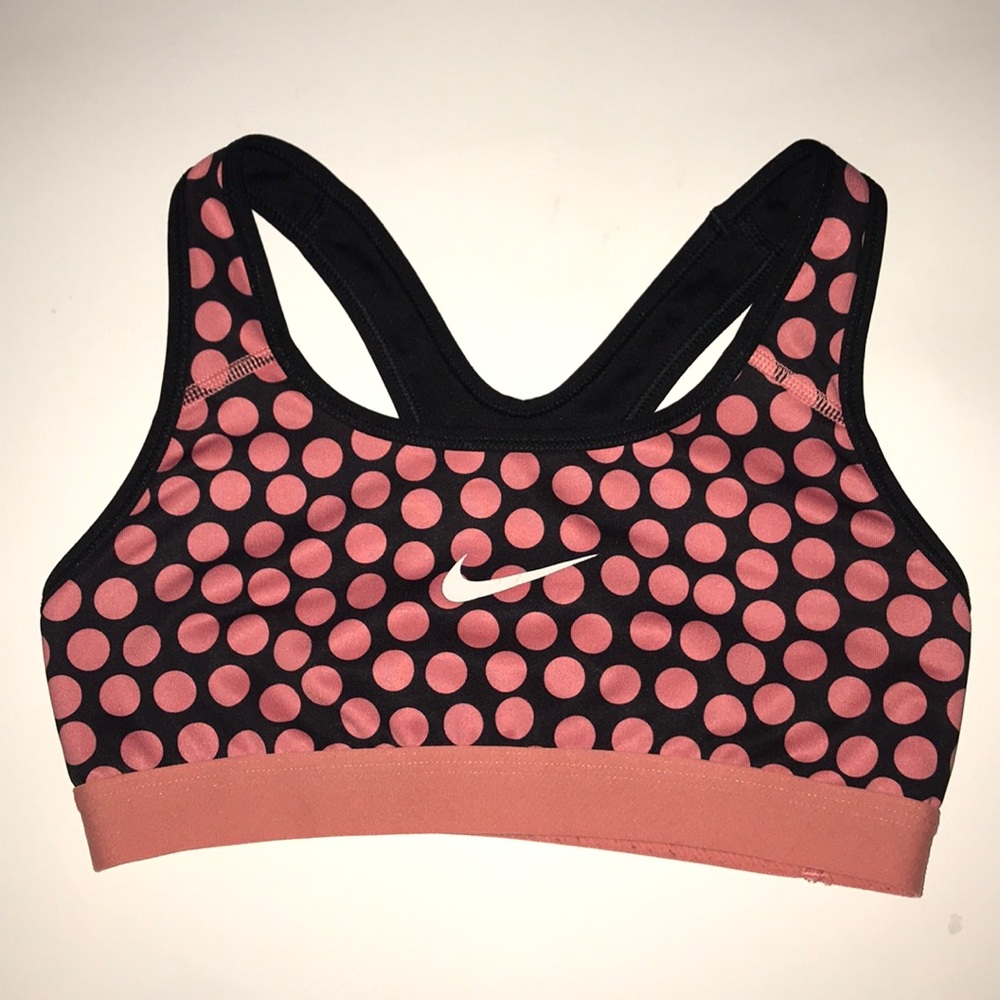 Pink and black Nike Pro sports bra